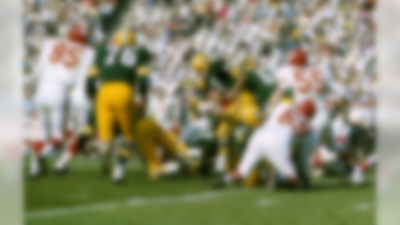 Green Bay Packers fullback Jim Taylor (31) runs up the field against the Kansas City Chiefs during Super Bowl I on January 15, 1967, at the Los Angeles Memorial Coliseum in Los Angeles, California. (National Football League)
