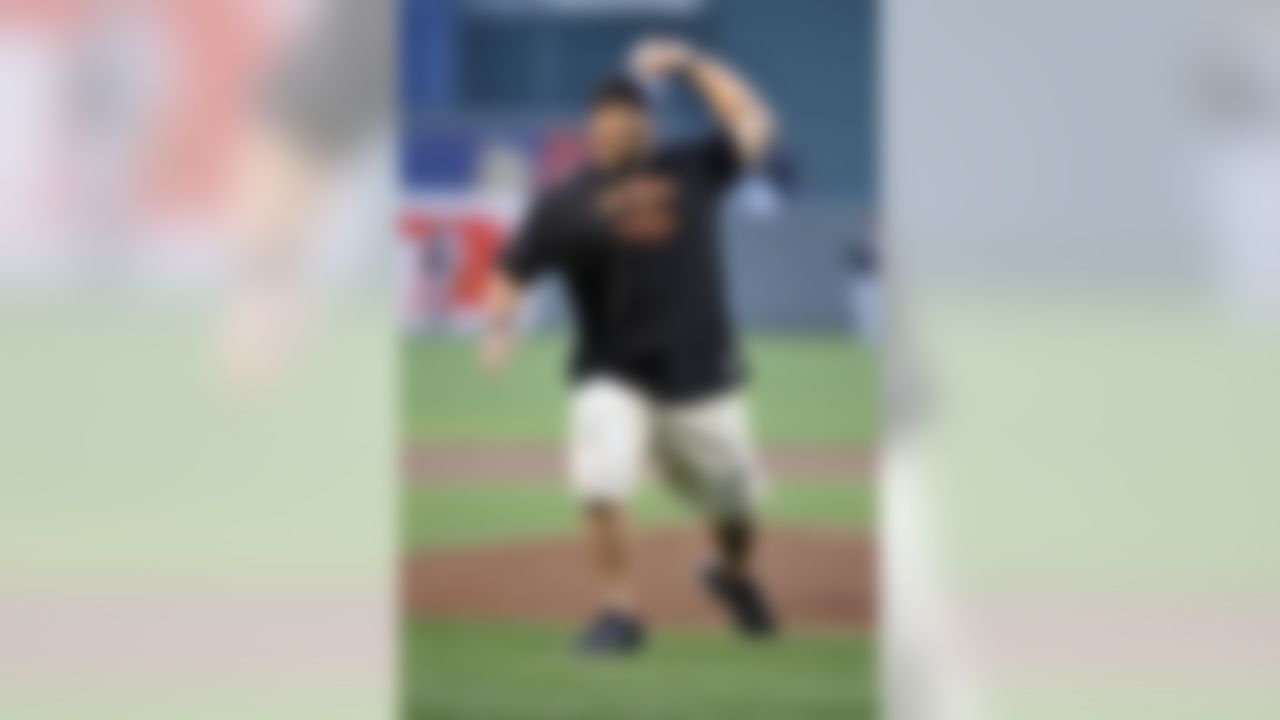 Baltimore Ravens defensive tackle Haloti Ngata throws out the first pitch before a game between the Chicago White Sox and the Baltimore Orioles at Oriole Park at Camden Yards. (Joy R. Absalon/USA TODAY Sports)