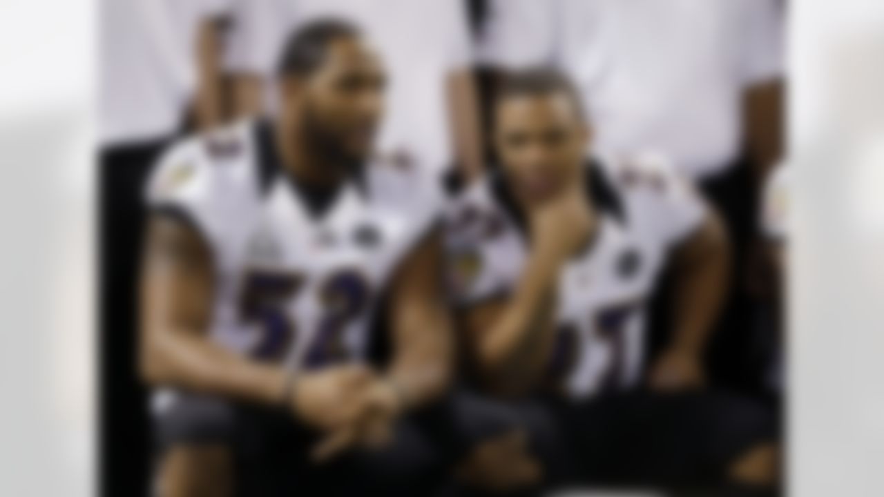 Baltimore Ravens linebacker Ray Lewis (52) talks to Ray Rice during media day for the NFL Super Bowl XLVII football game Tuesday, Jan. 29, 2013, in New Orleans. (AP Photo/Mark Humphrey)