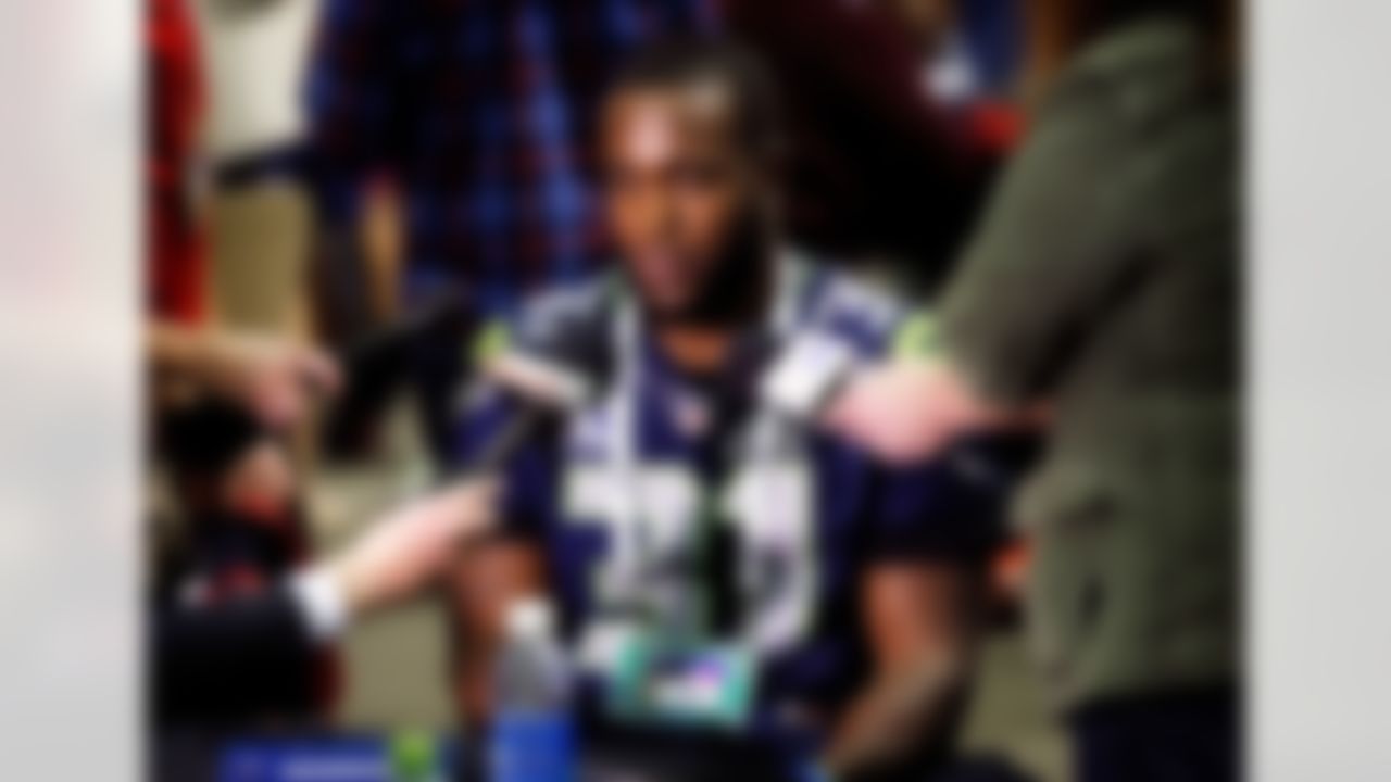 Seattle Seahawks' Kam Chancellor answers a question during an interview for NFL Super Bowl XLIX football game, Thursday, Jan. 29, 2015, in Phoenix. The Seahawks play the New England Patriots in Super Bowl XLIX on Sunday, Feb. 1, 2015. (AP Photo/Matt York)