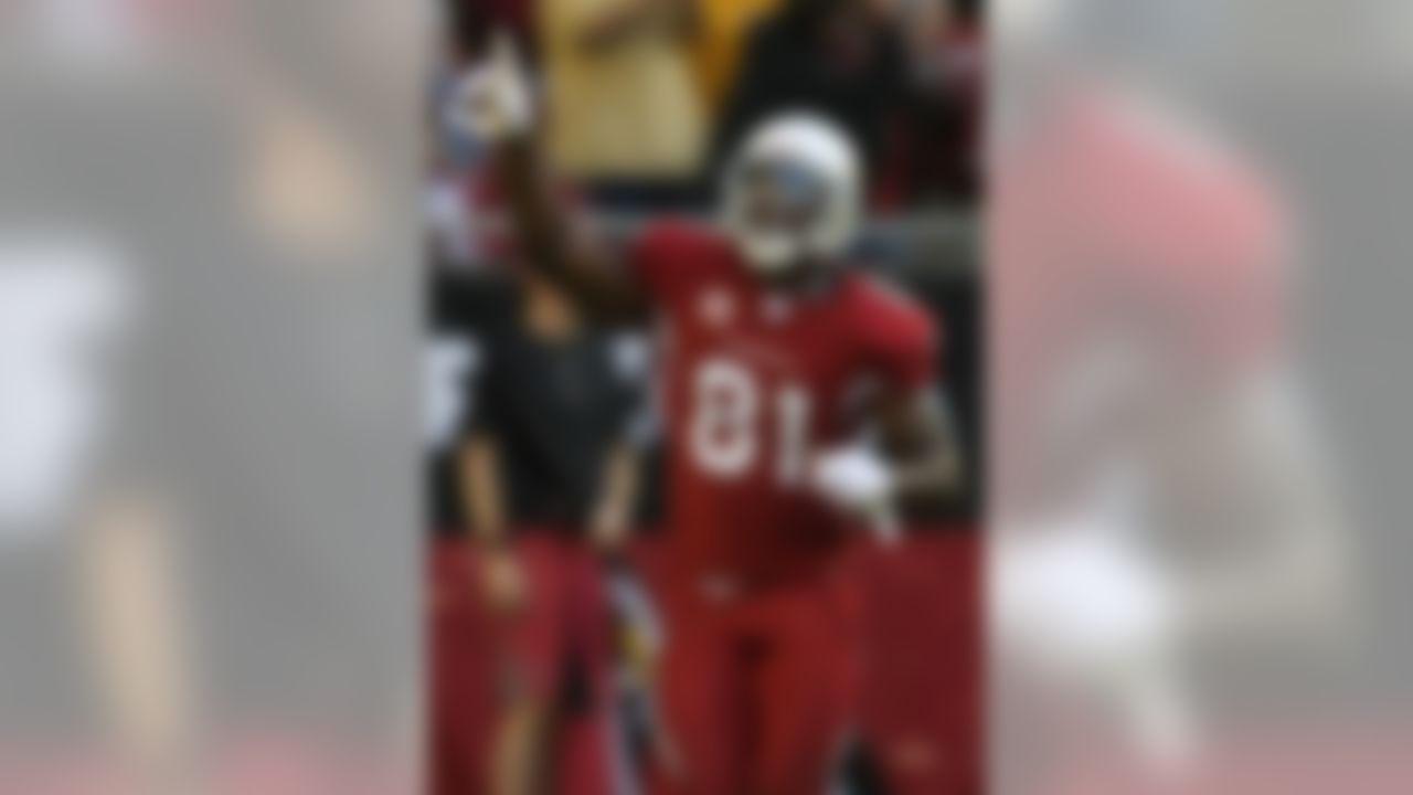 GLENDALE, AZ - DECEMBER 30: Wide receiver Anquan Boldin #81 of the Arizona Cardinals celebrates after scoring a touchdown against the St. Louis Rams at University of Phoenix Stadium December 30, 2007 in Glendale, Arizona. The Cardinals won 48-19. (Photo by Stephen Dunn/Getty Images)