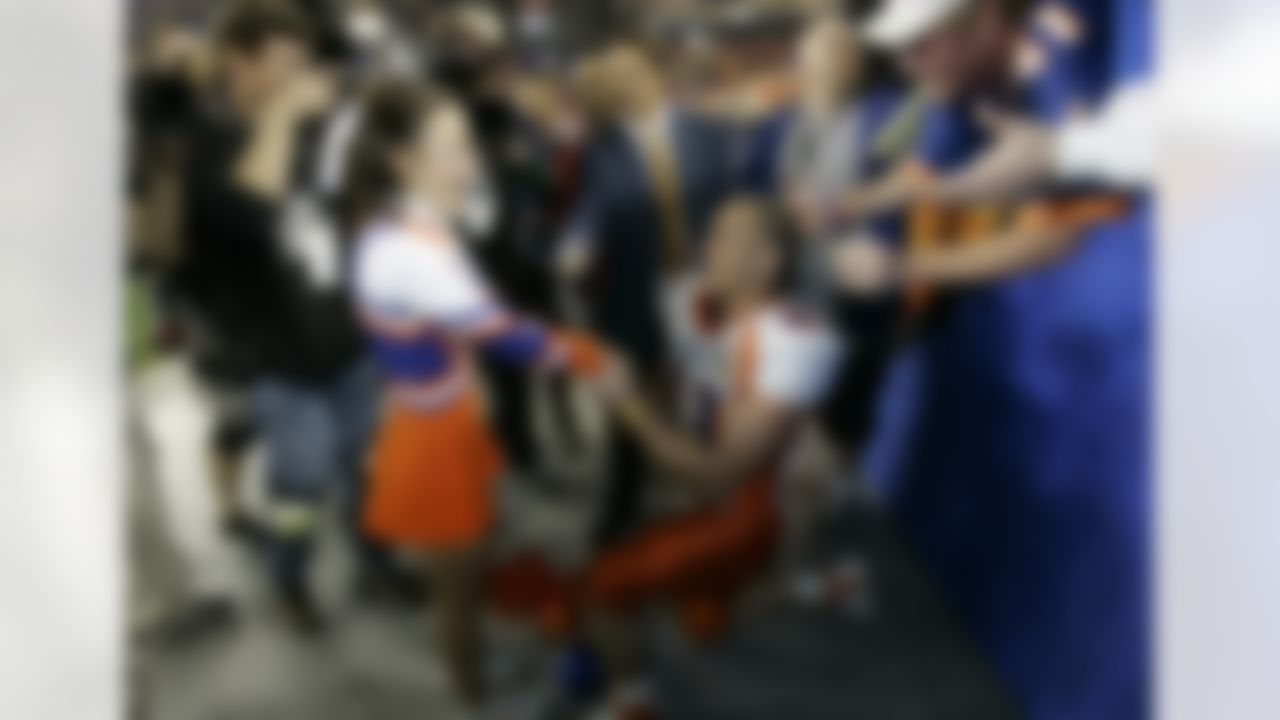 Moments after scoring the game-winning two-point conversion in the 2007 Fiesta Bowl, Ian Johnson dropped to one knee and proposed to his then-girlfriend, Chrissy Popadics. The couple is now married.
Video: On the Fringe, Ian Johnson
(AP Photo/Ted S. Warren)