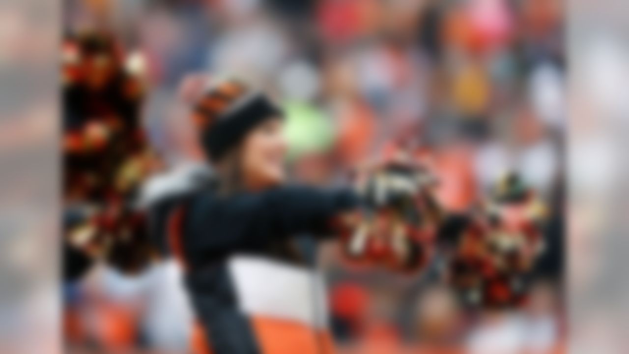 A Cincinnati Bengals cheerleader performs during an NFL wild card football game against the San Diego Chargers at Paul Brown Stadium on January 6, 2014 in Cincinnati, Ohio. (Aaron M. Sprecher/NFL)