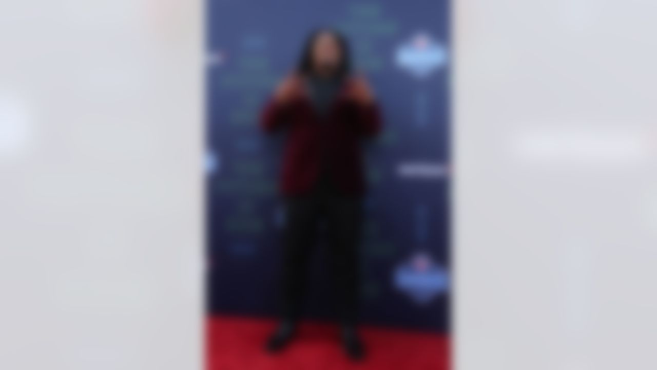 Washington defensive tackle Vita Vea poses for photos