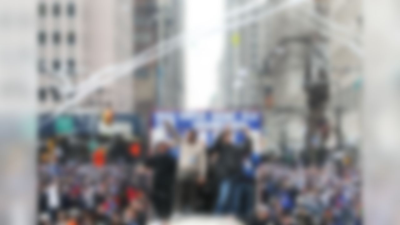 NEW YORK - FEBRUARY 05: (L-R) Mayor of New York Michael Bloomberg, Michael Strahan, and Eli Manning of the New York Giants ride in a float along Broadway, also known as "The Canyon of Heroes" during Super Bowl XLII victory parade in New York City. (Photo by Al Bello/Getty Images)
