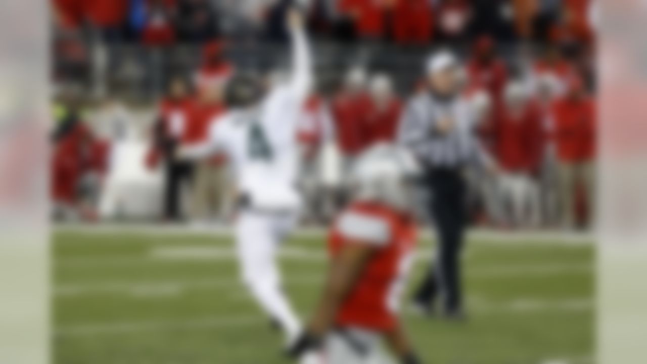 Nov 21, 2015; Columbus, OH, USA; Michigan State Spartans place kicker Michael Geiger (4) celebrates after making the game-winning field goal on the final play of the game against the Ohio State Buckeyes at Ohio Stadium. The Spartans won 17-14. Mandatory Credit: Geoff Burke-USA TODAY Sports