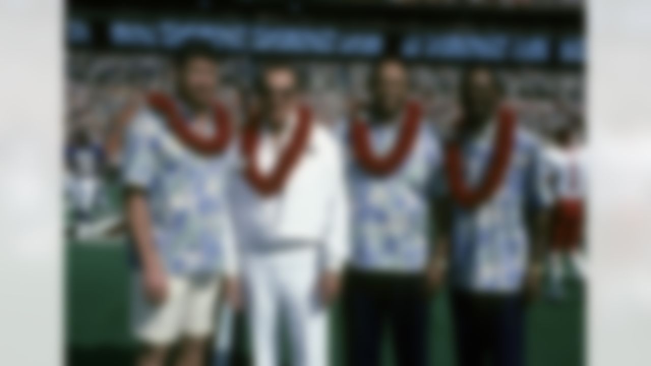 John Riggins, Al Davis, John Mackey, and Lem Barney are introduced as the Pro Football Hall of Fame Class of 1992 on the field before the NFC's 21-15 victory over the AFC in the 1992 NFL Pro Bowl played on February 2, 1992 at Aloha Stadium in Honolulu, Ha. (National Football League)