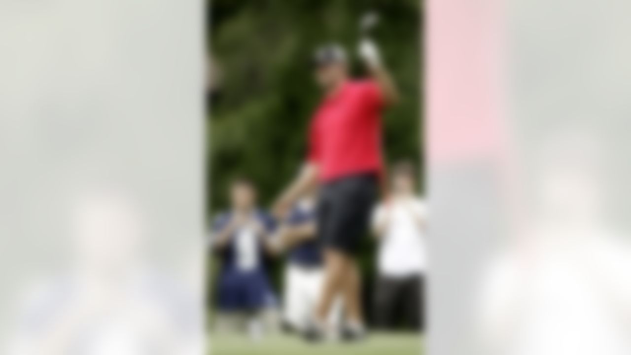 Dallas Cowboys quarterback Tony Romo reacts to his tee shot on the 14th hole during sectional qualifying for the U.S. Open golf tournament Monday, June 7, 2010, at the Club at Carlton Woods in The Woodlands, Texas. The U.S. Open will be played June 14-20 at Pebble Beach Golf Links in Pebble Beach, Calif. (AP Photo/David J. Phillip)
