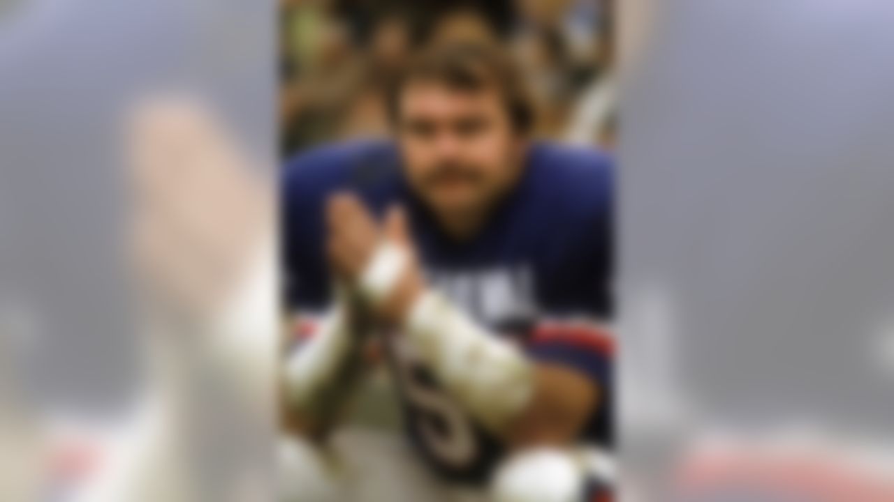 Chicago Bears linebacker Dick Butkus #51 of the National Conference watches from the bench against the American Conference in the 1971 NFL Pro Bowl on January 24, 1971 at the Los Angeles Memorial Coliseum in the Los Angeles, California. (National Football League)