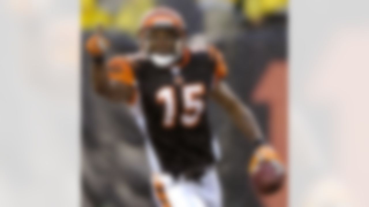 Cincinnati Bengals receiver Chris Henry celebrates after catching a touchdown pass against the Pittsburgh Steelers in a football game in Cincinnati, in this Dec. 31, 2006 file photo. (AP Photo/David Kohl)