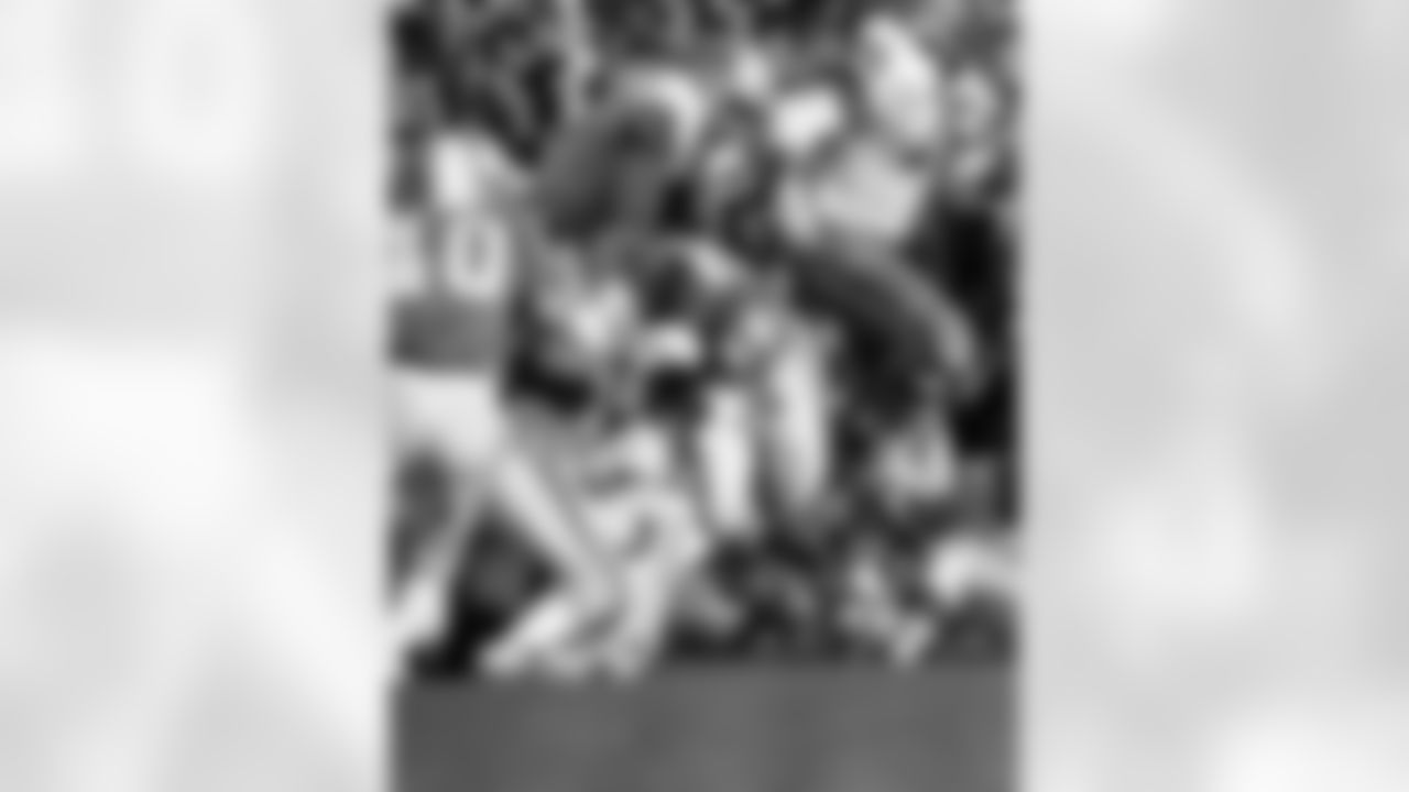 Dallas Cowboys running back Calvin Hill (35) dives over the pile as Hall of Fame Dolphins linebacker Nick Bouniconti (85) makes a stop in a 24 to 3 Cowboys win over the Miami Dolphins in Super Bowl VI on Jan. 16, 1972 at Tulane Stadium in New Orleans, La. (National Football League)