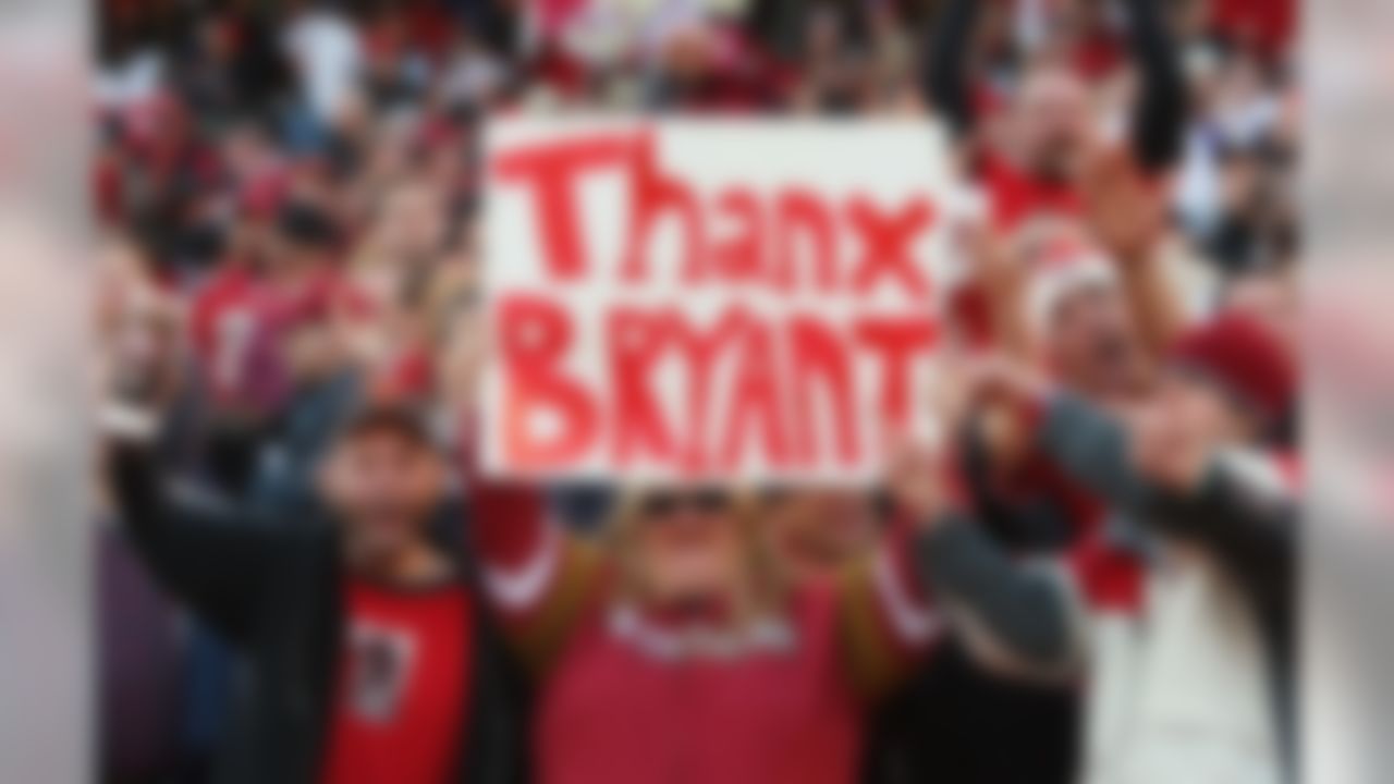SAN FRANCISCO - DECEMBER 23: San Francisco 49ers fans hold up a Thanks Bryant sign thanking defensive end Bryant Young #97 of the Niners for a long and illustrious career at the end of the game against the Tampa Bay Buccaneers on December 23, 2007 at Monster Park in San Francisco, California. The Niners defeated the Bucs 21-19. (Photo by Paul Spinelli/Getty Images)