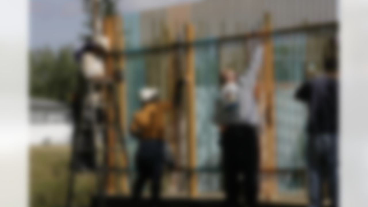 The Home Depot NFL Neighborhood MVP Build with Miami Dolphins Offensive Tackle Vernon Carey. (Photo by Andrew Coppley, CIA Stock Photography, Inc.)