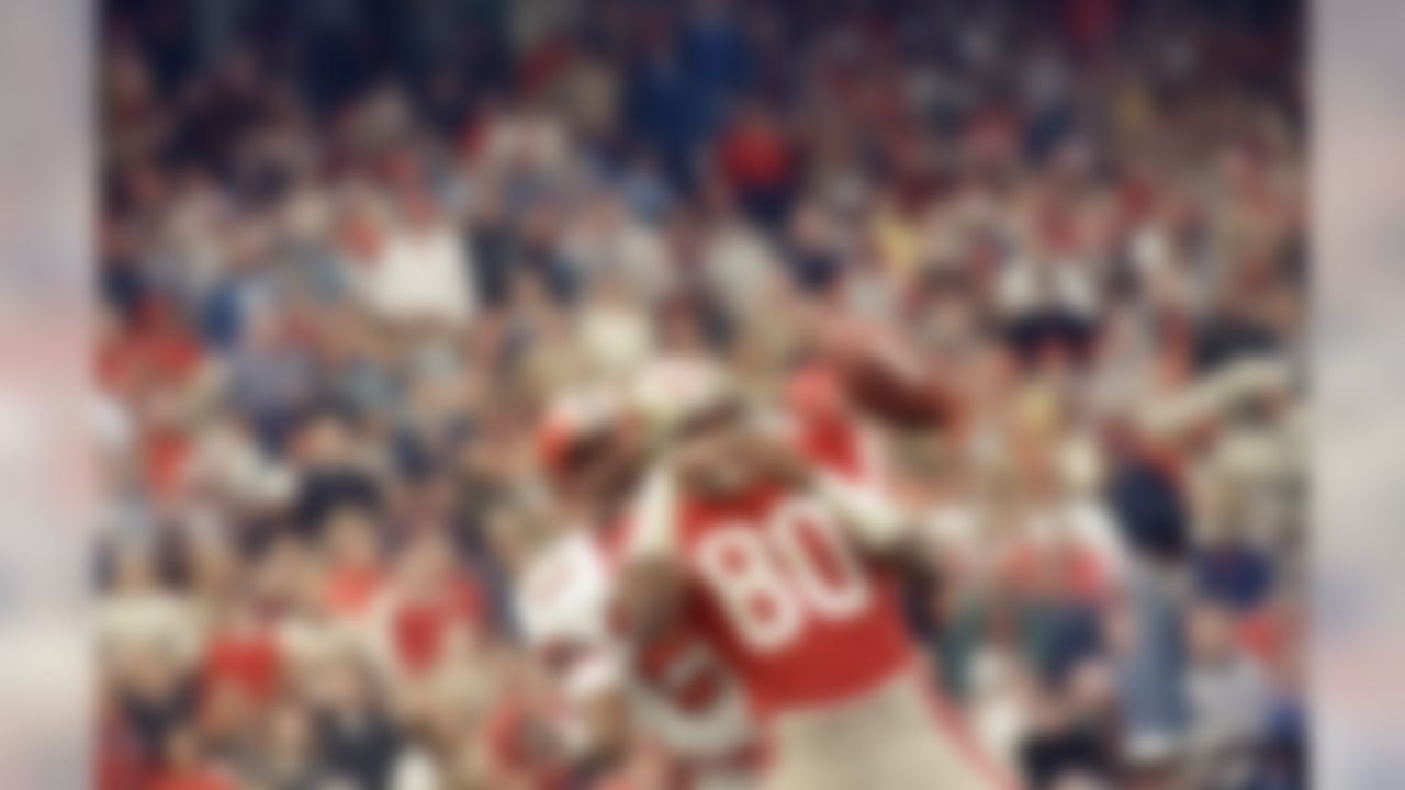 49ers wide receiver Jerry Rice (80), who set an NFL record on Sunday, Dec. 21, 1987 in San Francisco, with his 19th touchdown reception of the season, let this one get by in third quarter with Atlanta Falcons cornerback Bobby Butler (23) hanging in behind him. In 49ers 35-7 victory, Rice scored three times, twice on passes, for the fourth time in the past five games. (AP Photo/Paul Sakuma)