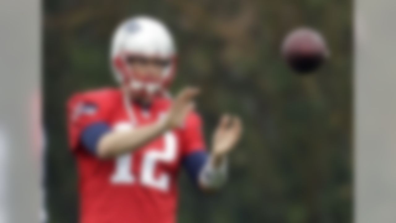 New England Patriots quarterback Tom Brady warms up during practice Friday, Jan. 30, 2015, in Tempe, Ariz. The Patriots play the Seattle Seahawks in NFL football Super Bowl XLIX Sunday, Feb. 1. (AP Photo/Mark Humphrey)