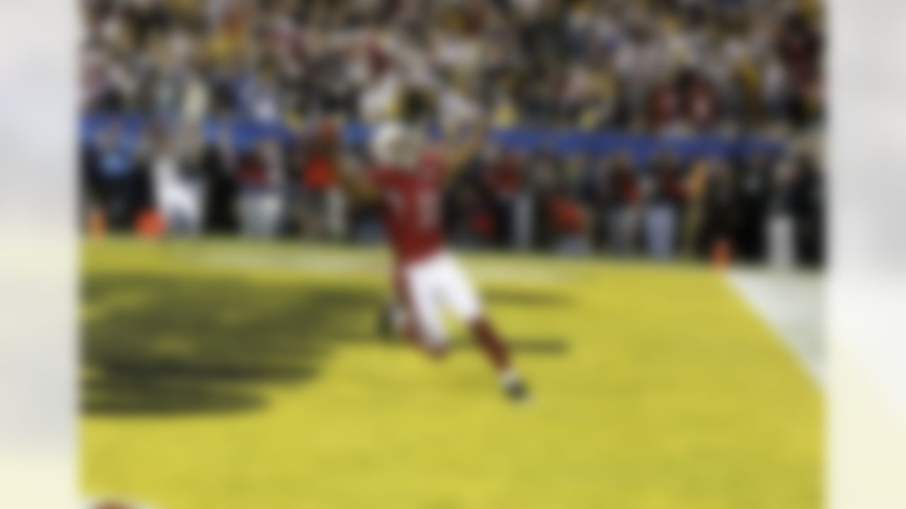 Arizona Cardinals wide receiver Larry Fitzgerald celebrates his 64-yard touchdown reception against the Pittsburgh Steelers in the fourth quarter ofthe NFL Super Bowl XLIII football game, Sunday, Feb. 1, 2009, in Tampa, Fla. (AP Photo/Ross D. Franklin)