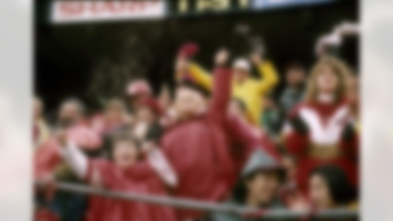 San Francisco 49ers fans cheer on their team during the NFC Divisional Game, a 44-15 49ers victory over the Chicago Bears on January 7, 1995, at Candlestick Park in San Francisco, California. 1994 NFC Divisional Game - Chicago Bears vs San Francisco 49ers - January 7, 1995 (National Football League)