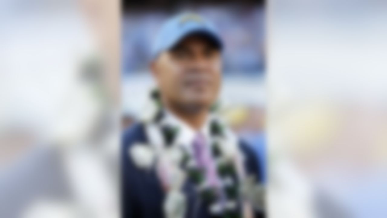 Former San Diego Chargers linebacker Junior Seau wears a lei at a halftime ceremony inducting him into the Chargers Ring of Honor during the NFL week 12 football game against the Denver Broncos on Sunday, November 27, 2011 in San Diego, California. The Broncos won the game in overtime 16-13. (AP Photo/Paul Spinelli)