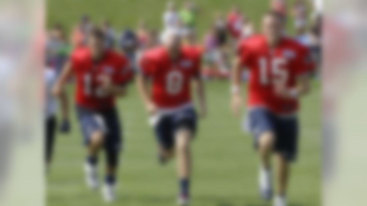 New England Patriots quarterback Tom Brady (12) and his two backups Brian Hoyer (8) and Ryan Mallett (15) run sprints at the end of practice during NFL football training camp in Foxborough, Mass., Thursday, Aug. 2, 2012. (AP Photo/Stephan Savoia)