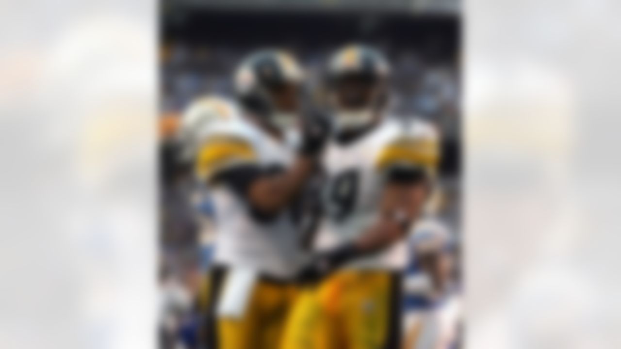 SAN DIEGO - OCTOBER 8: Running back Willie Parker #39 of the Pittsburgh Steelers celebrates with split end Cedrick Wilson #80 during the game against the San Diego Chargers on October 8, 2006 at Qualcomm Park in San Diego, California. The Chargers won 23-13. Photo by Getty Images.