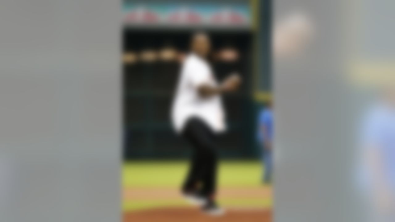 Houston Texans strong safety D.J. Swearinger (36) throws out the ceremonial first pitch prior to an MLB baseball game between the Kansas City Royals against the Houston Astros at Minute Maid Park on Thursday April 17, 2014 in Houston, Texas. Kanas City won 5-1. (AP Photo/Aaron M. Sprecher)
