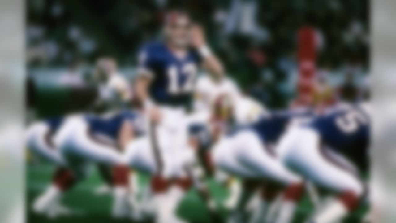 Hall of Fame quarterback Jim Kelly (12) of the Buffalo Bills calls signals at the line of scrimmage during the Bills 37-24 loss to the Washington Redskins in Super Bowl XXVI on January 26, 1992 at the Hubert H. Humphrey Metrodome in Minneapolis, Minnesota (National Football League)