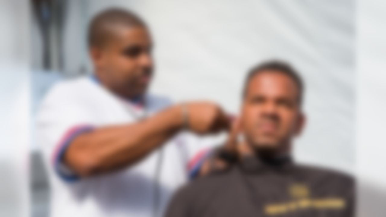 Andre Reed attends the "Inside Training Camp - Making The Cut" pop-up barbershop hosted by NFL Network at St. John Fisher College Practice Facility on August 6, 2015 in Rochester, New York.  (Brett Carlsen/NFL)