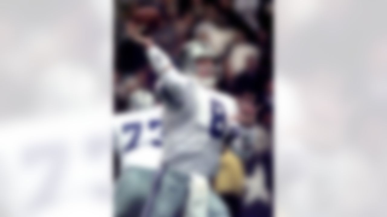 Dallas Cowboys quarterback Troy Aikman throws a pass downfield during the second quarter against the Washington Redskins in Irving, Texas, in this Dec. 27, 1998 photo. (AP Photo/Eric Gay)