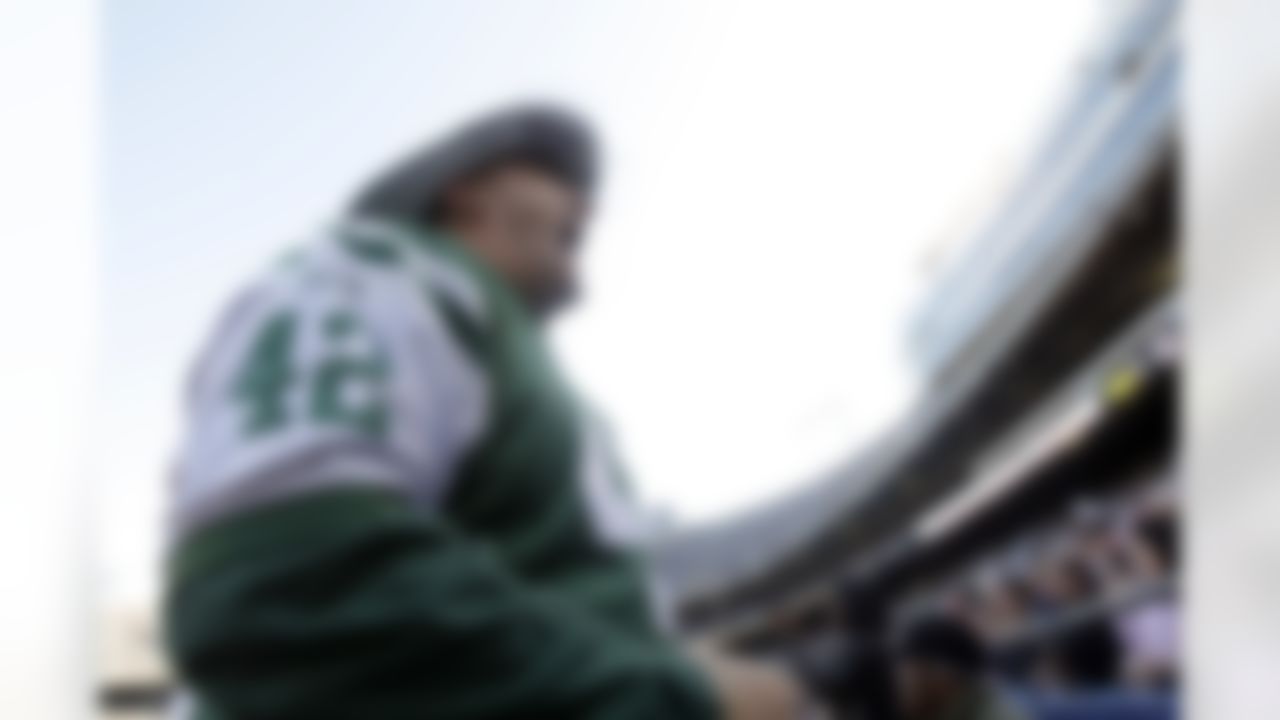 New York Jets fan, Fireman Ed Anzalone, looks on during the first quarter of an NFL football game against the Carolina Panthers Sunday, Nov. 29, 2009, in East Rutherford, N.J. (AP Photo/Frank Franklin II)