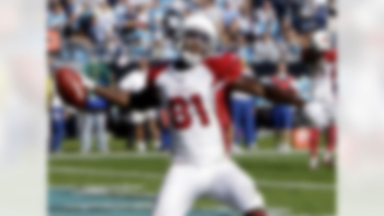 Arizona Cardinals' Anquan Boldin (81) reacts after catching a touchdown pass in the fourth quarter of the Cardinals' 27-23 loss to the Carolina Panthers in an NFL football game in Charlotte, N.C., Sunday, Oct. 26, 2008. (AP Photo/Chuck Burton)