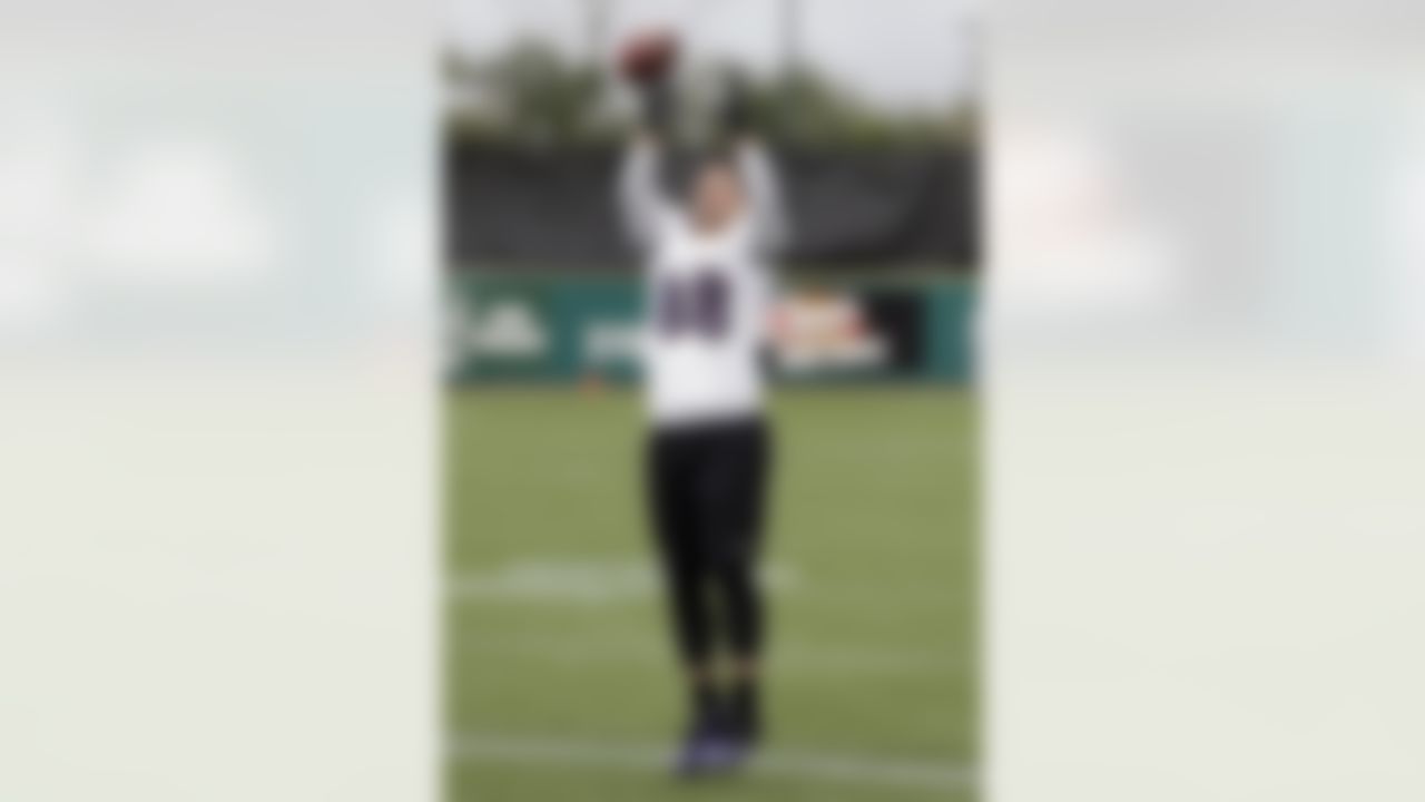 Baltimore Ravens tight end Dennis Pitta reaches for a pass as he warms up during an NFL Super Bowl XLVII football practice on Wednesday, Jan. 30, 2013, in New Orleans. The Ravens face the San Francisco 49ers in Super Bowl XLVII on Sunday, Feb. 3. (AP Photo/Patrick Semansky)