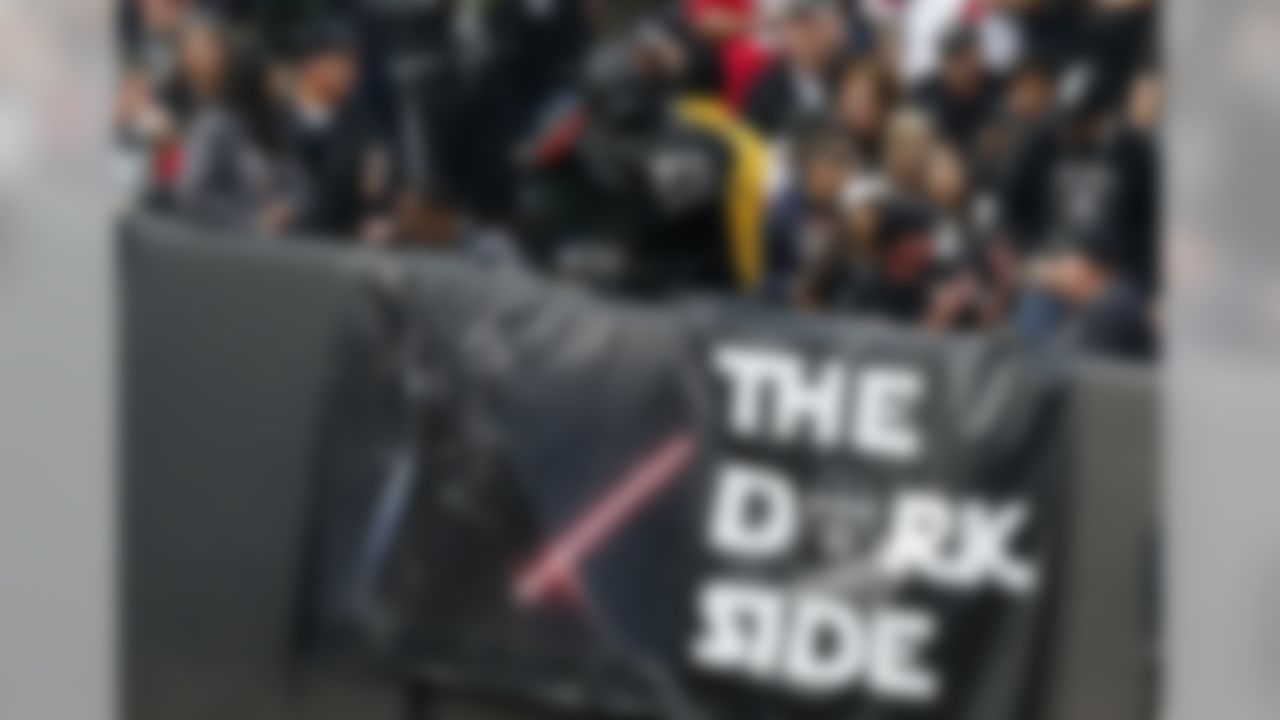 Oakland Raiders Dark Raiders fan watches during an NFL game against the San Francisco 49ers  on Sunday, December 7, 2014 at O.co Coliseum. The Raiders defeated the 49ers 24-13. (AP Photo/Kevin Terrell)