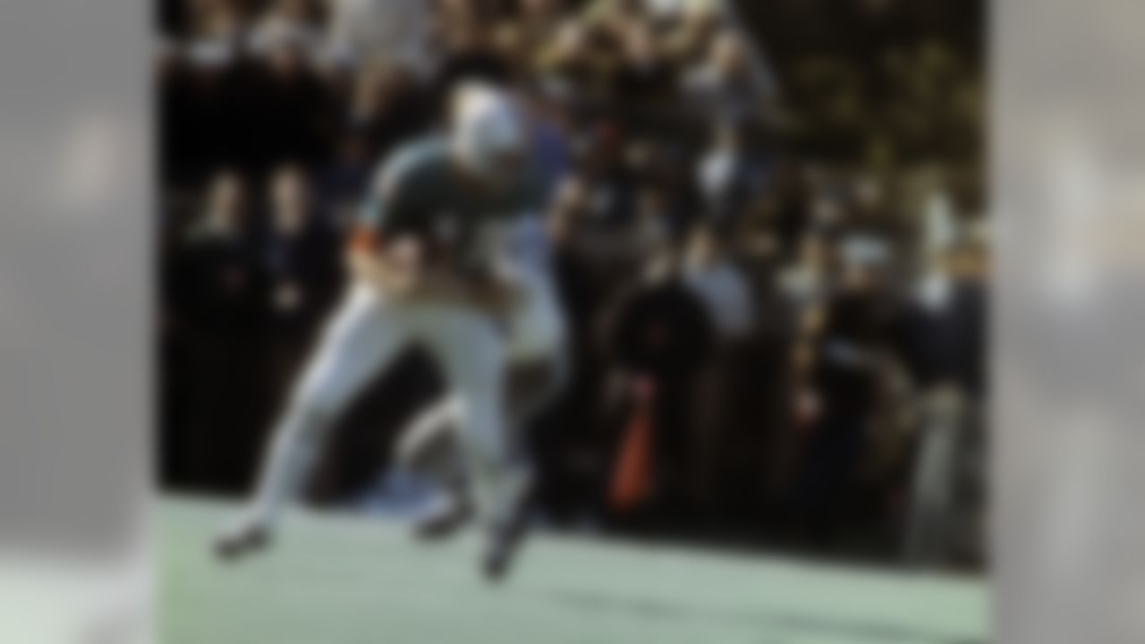 Hall of Fame defensive tackle Bob Lilly (74) of the Dallas Cowboys sacks Dolphins Hall of Fame quarterback Bob Griese (12) for a 29-yard loss during the Cowboys 24-3 victory over the Miami Dolphins in Super Bowl VI on January 16, 1972 at Tulane Stadium in New Orleans, Louisiana. (National Football League)