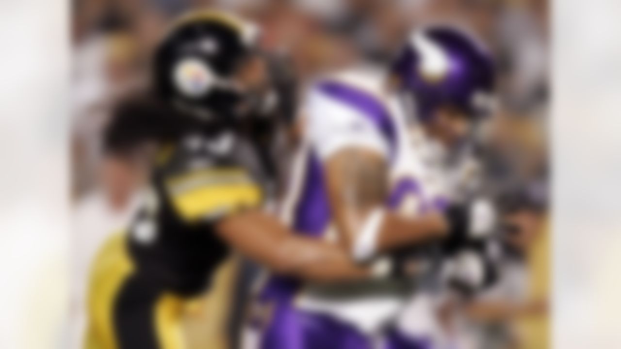 PITTSBURGH - AUGUST 19: Jermaine Wiggins #85 of the Minnesota Vikings gets past the tackle of Troy Polamalu #43 of the Pittsburgh Steelers for a first quarter touchdown during a pre season game on August 19, 2006 at Heinz Field in Pittsburgh, Pennsylvania. Photo by Getty Images.