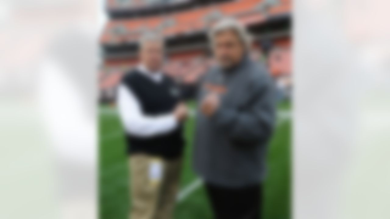 Head coach Rex Ryan of the New York Jets on the field with his brother, defensive coordinator for the Cleveland Browns, Rob Ryan on Sunday, November 14, 2010 in the Cleveland Browns Stadium in Cleveland, Ohio. (AP Photo/David Drapkin)