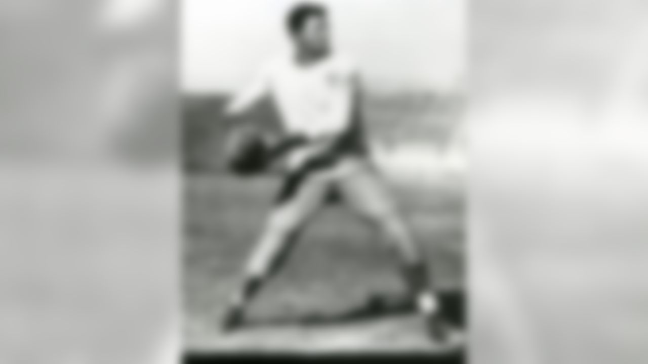 Quarterback Sammy Baugh of the Texas Christian University Horned Frogs throws a pass during practice circa 1936 in Fort Worth, TX. (National Football League)