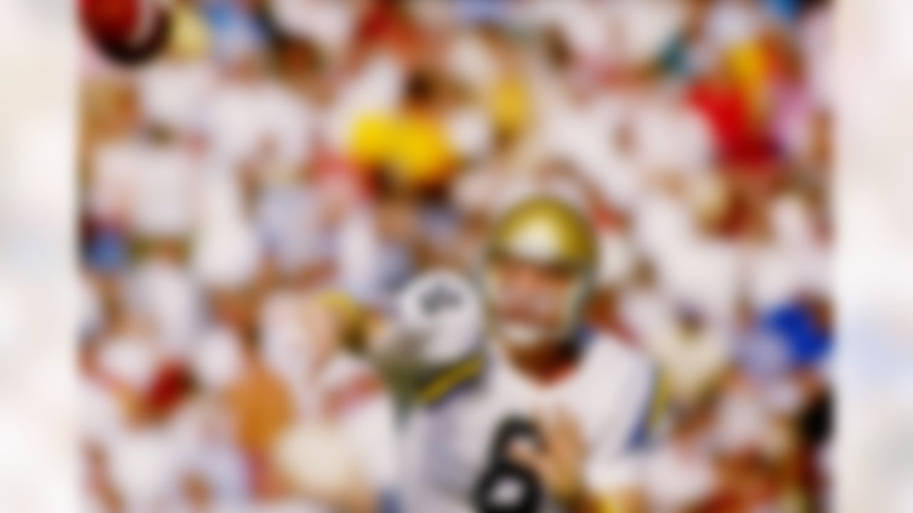 Quarterback Troy Aikman of the UCLA Bruins in action during a game against the USC Trojans at the Los Angeles Coliseum in Los Angeles, California. (Tony Duffy/Allsport)