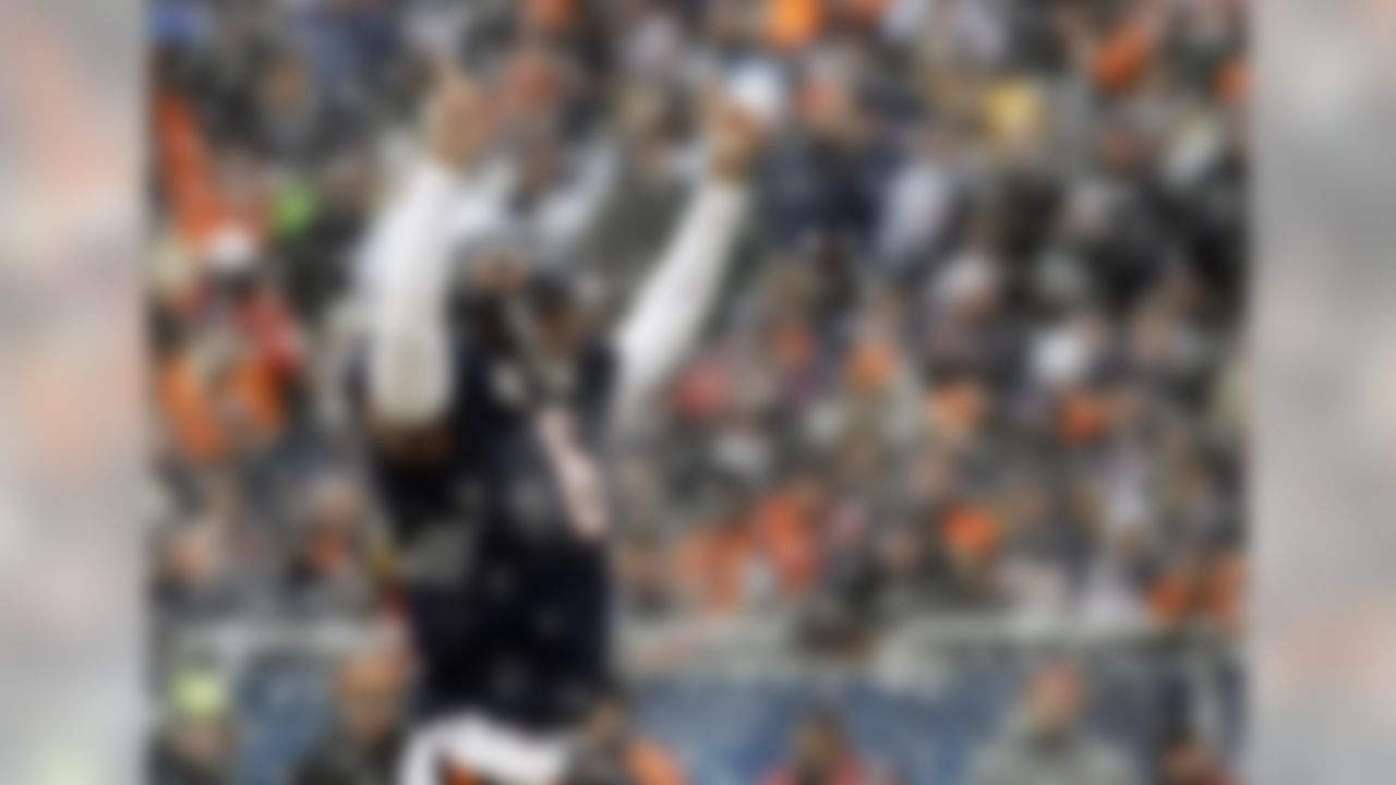 Chicago Bears quarterback Jay Cutler (6) reacts after running back Chester Taylor rushed for a touchdown during the first half an NFL divisional playoff football game against the Seattle Seahawks, Sunday, Jan. 16, 2011, in Chicago. (AP Photo/Kiichiro Sato)