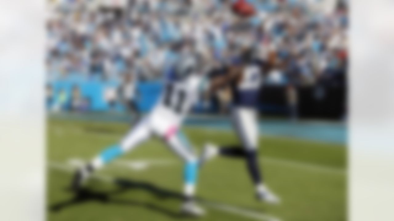 Carolina Panthers wide receiver Brandon LaFell (11) reaches for a deep pass broken up by Dallas Cowboys strong safety Eric Frampton (27) with 24 seconds left during the NFL week 7 football game on Sunday, Oct. 21, 2012 in Charlotte, N.C. The Cowboys won the game 19-14. (AP Photo/Paul Spinelli)