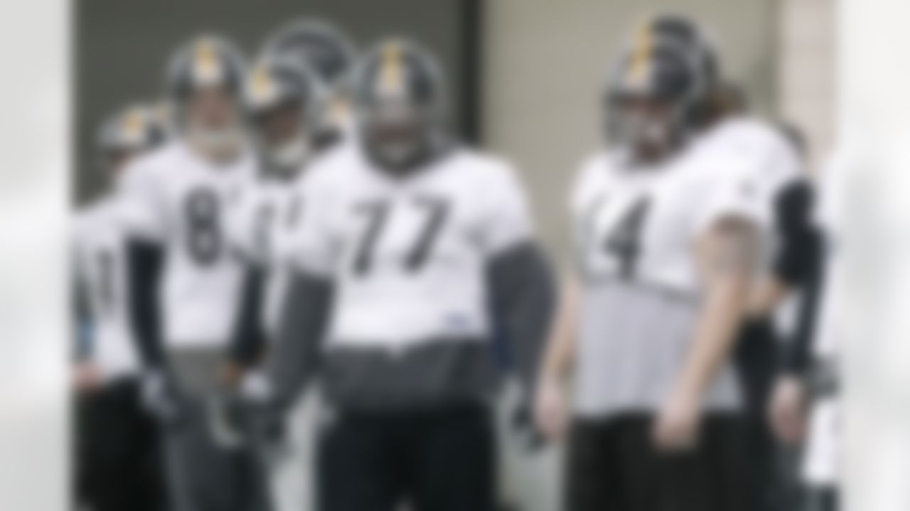 Pittsburgh Steelers center Doug Legursky (64), guard Dorian Brooks (77), and other linemen listen to a coach during practice on Friday, Feb. 4, 2011, in Fort Worth, Texas. The Steelers will play the Green Bay Packers in NFL football Super Bowl XLV Sunday, Feb. 6. (AP Photo/Mark Humphrey)