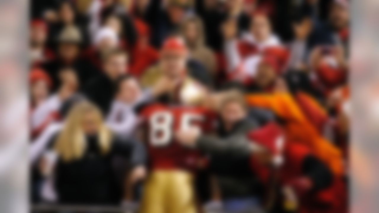 SAN FRANCISCO - DECEMBER 15: Vernon Davis #85 of the San Francisco 49ers celebrates with fans in the stands after catching a touchdown pass against the Cincinnati Bengals on December 15, 2007 at Monster Park in San Francisco, California. (Photo by Joe Robbins/Getty Images)