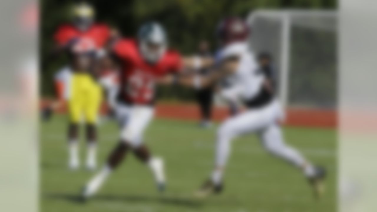 East wide receiver Keith Mumphrey (25), of Michigan State, eludes cornerback Craig Mager, of Texas State during practice for the East-West Shrine college football game Tuesday, Jan. 13, 2015, in St. Petersburg, Fla. (Chris O'Meara/Associated Press)