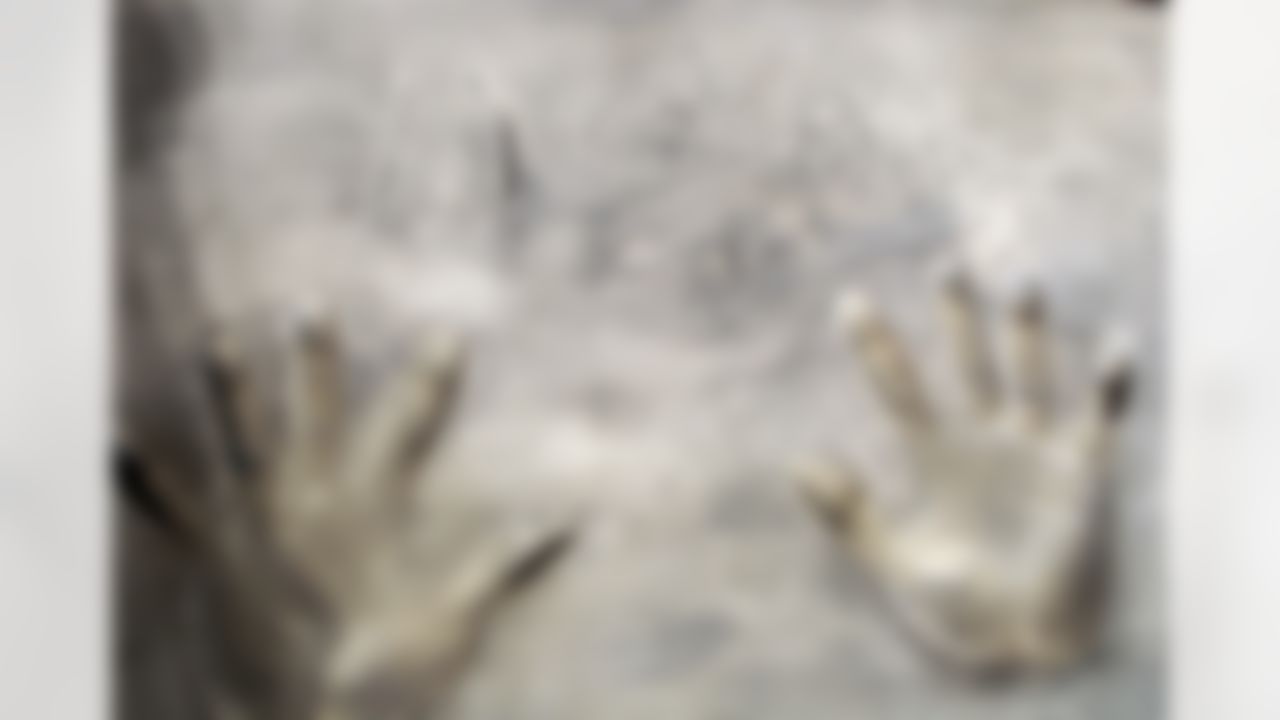 Hand prints of former NFL player Warran Sapp are seen at NFL Experience, Monday Jan. 31, 2012, in Indianapolis, Indiana. (Ben Liebenberg/NFL)