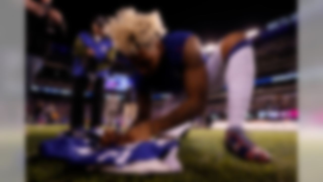 New York Giants wide receiver Odell Beckham (13) signs his jersey during the NFL regular season game against the Cincinnati Bengals and the New York Giants on Monday, Nov. 14, 2016 in East Rutherford, NJ. (Ric Tapia/NFL)