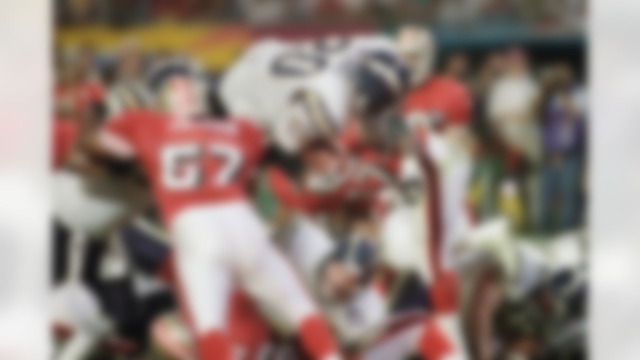 San Diego Chargers running back Natrone Means (20) dives over the San Francisco 49ers line for a touchdown during the first quarter on Sunday, Jan. 29, 1995, during Super Bowl XXIX at Joe Robbie Stadium in Miami. (AP Photo/Beth A. Keiser)