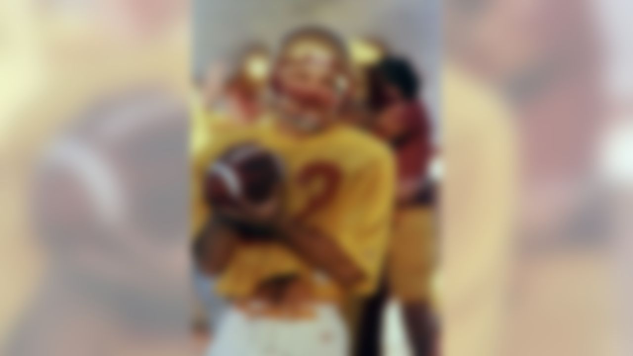 Boston College quarterback Doug Flutie is pictured during team drills at Boston College, Oct. 17, 1984. (AP Photo/Peter Southwick)