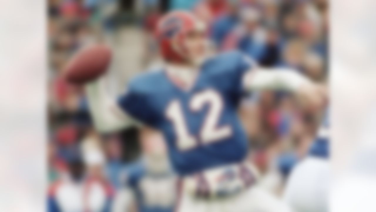 Buffalo Bills quarterback Jim Kelly (12) heaves a pass during the third quarter of AFC playoff game against the Kansas City Chiefs in Orchard Park, New York on Sunday, Jan. 5, 1992. Kelly threw three touchdown passes as the Bills won 37-14 to advance to the AFC Championship Game. (AP Photo/Bill Sikes)