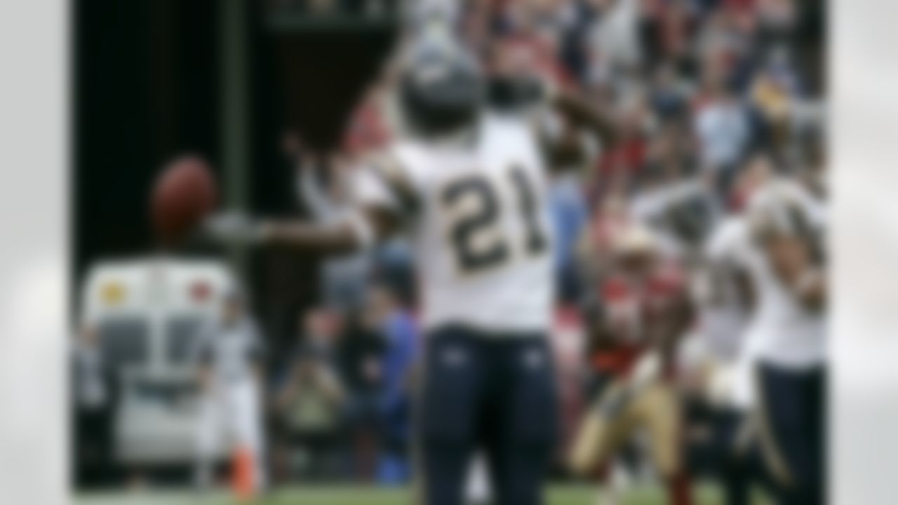 Running back Ladainian Tomlinson #21 of the San Diego Chargers celebrates his first of four touchdowns against the San Francisco 49ers at Monster Park October 15, 2006 in San Francisco, California. The Chargers defeated the 49ers 48-10. (AP Photo/Scott Boehm)