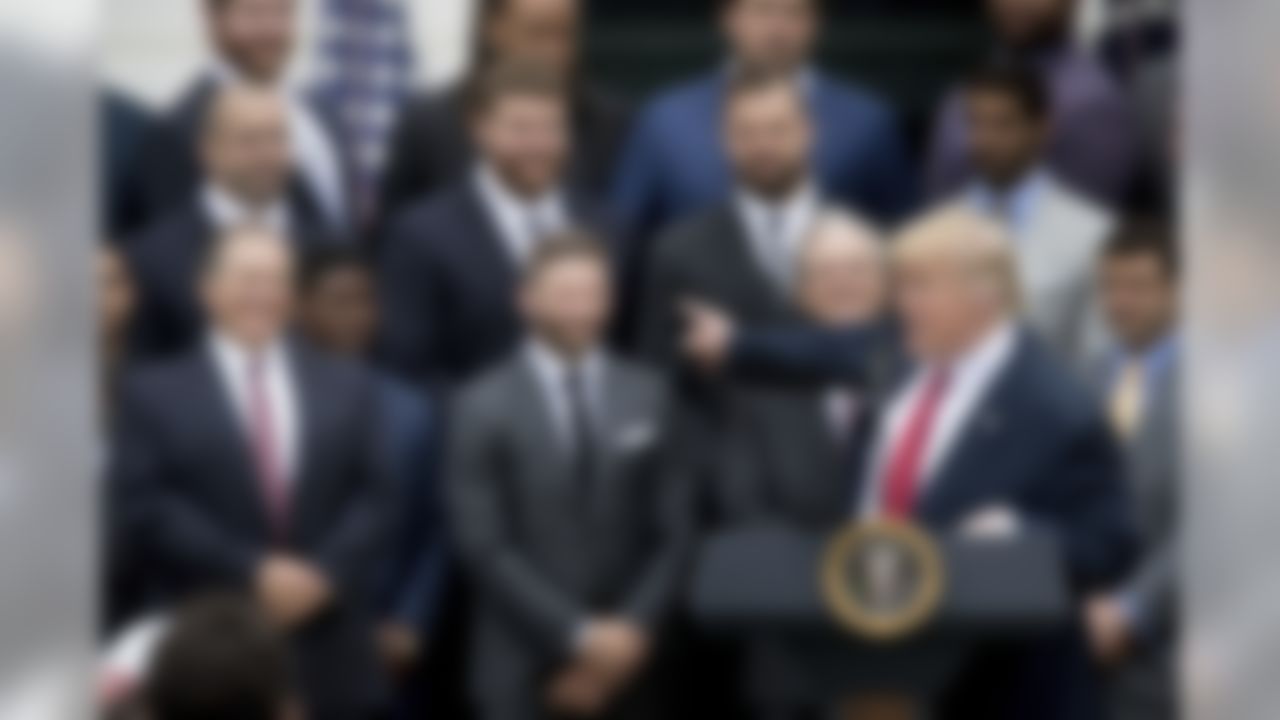 President Donald Trump points to New England Patriots head coach Bill Belichick, left, during a ceremony on the South Lawn of the White House in Washington, Wednesday, April 19, 2017, where he honored the Super Bowl Champion New England Patriots for their Super Bowl LI victory. (Andrew Harnik/Associated Press)