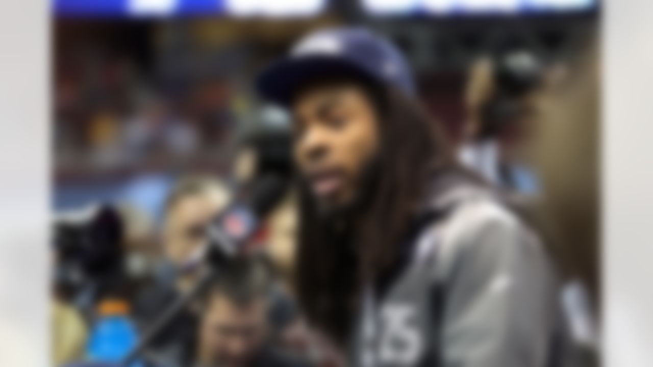 Seattle Seahawks cornerback Richard Sherman (25) answers questions from the media during the Super Bowl XLVIII Media Day at the Prudential Center on Tuesday, January 28, 2014 in Newark, NJ. (Ben Liebenberg/NFL)